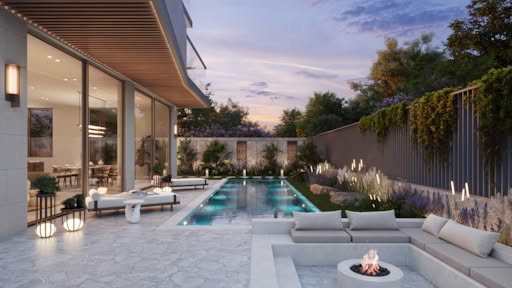 Modern villa with pool, seating area, and fire pit at dusk.