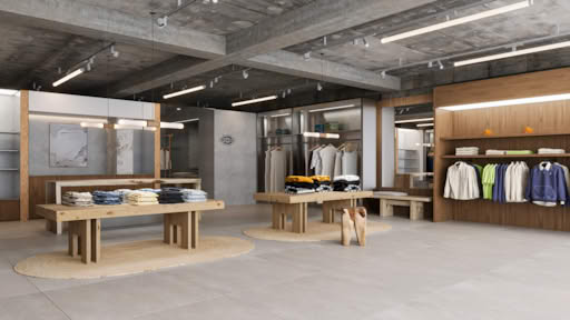 Dickies retail store showcasing folded clothes, jackets, and casual wear in a minimalist modern interior.