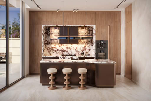 A modern kitchen with marble countertops and wooden cabinets.