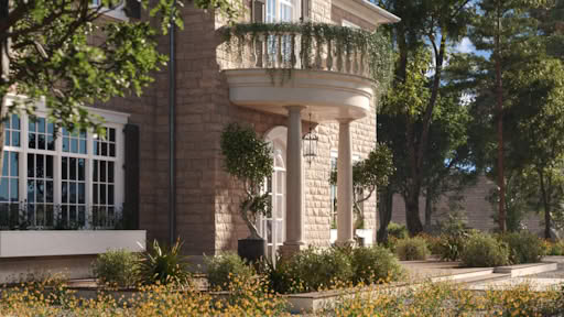 Close-up of Stonehaven Manor’s rounded stone balcony with columns, hanging greenery, and luxury architectural details.