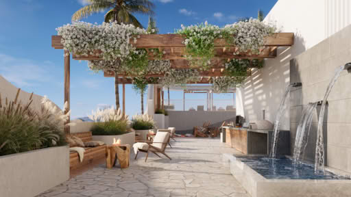 A modern rooftop patio with a pergola, water feature, and outdoor seating under clear sky.