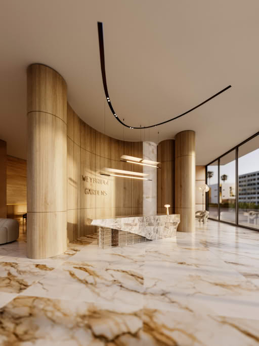 A modern lobby with marble floors, wooden columns, and a curved reception desk.