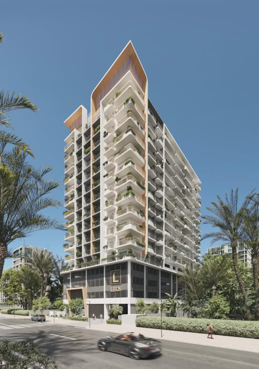 Modern residential building with balconies and greenery in Dubai.